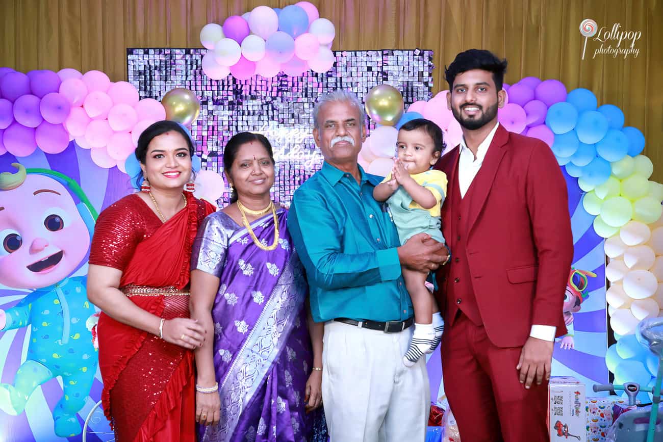 Kian with his family and grandparents at his birthday event, enjoying a memorable moment captured by Lollipop Photography in Chennai.