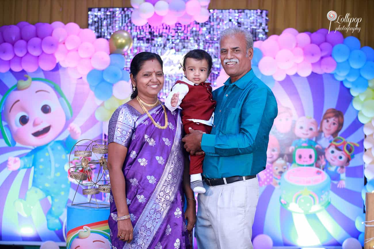 Kian with his grandparents, creating cherished family memories during his birthday celebration photoshoot by Lollipop Photography in Chennai.