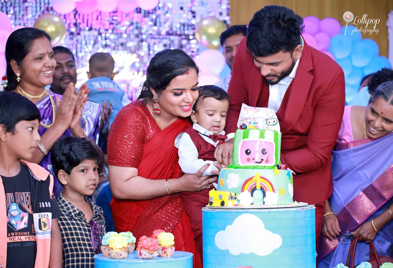 Kian and his family share a special moment cutting the cake during his birthday celebration in Chennai, documented by Lollipop Photography.