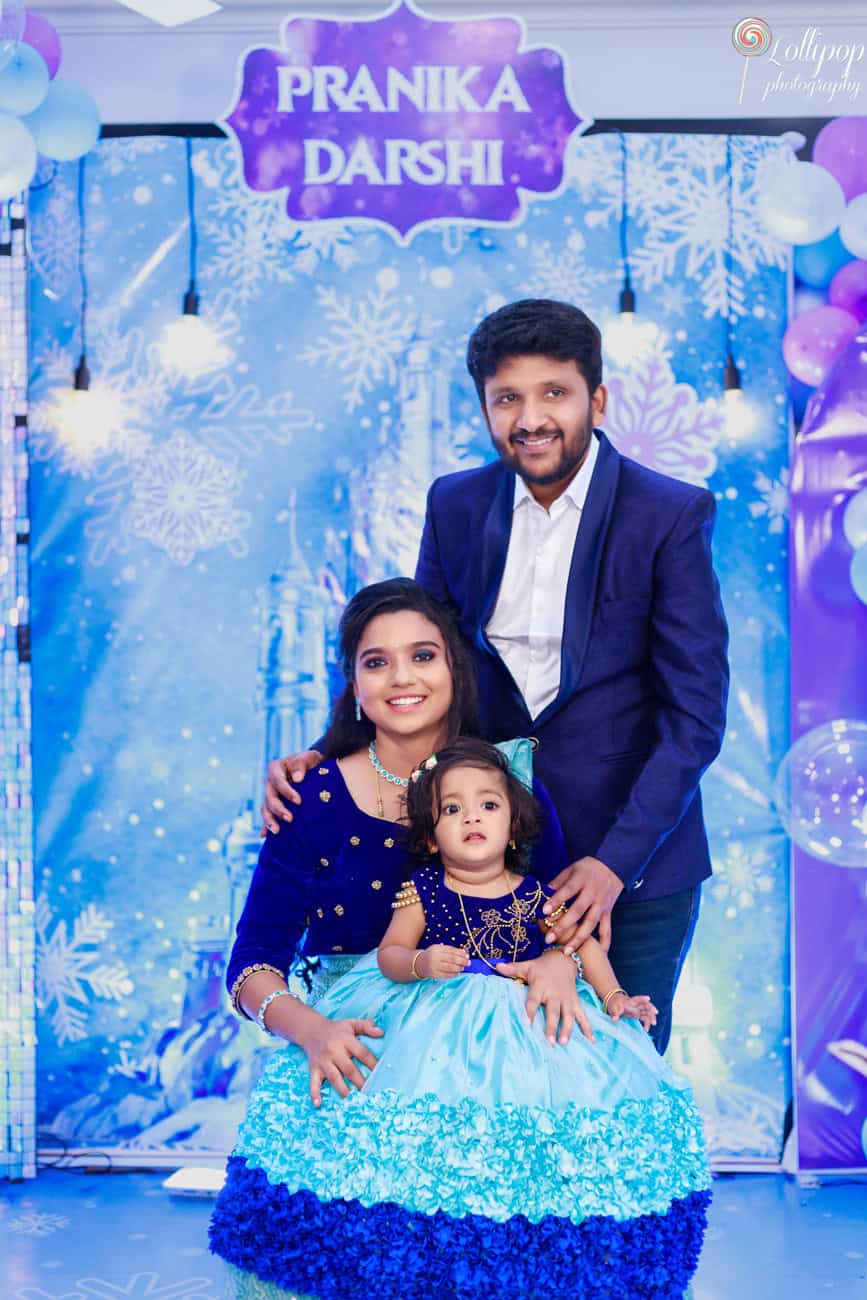 Pranika poses with her parents in a family photoshoot at her birthday celebration in Coimbatore, captured by Lollipop Photography