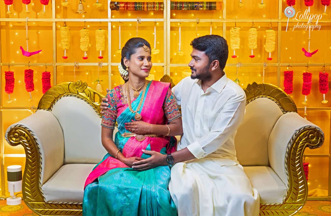 Heartwarming moment between Arthi and Naveen Kumar during their baby shower celebration in Chennai, captured by Lollipop Photography