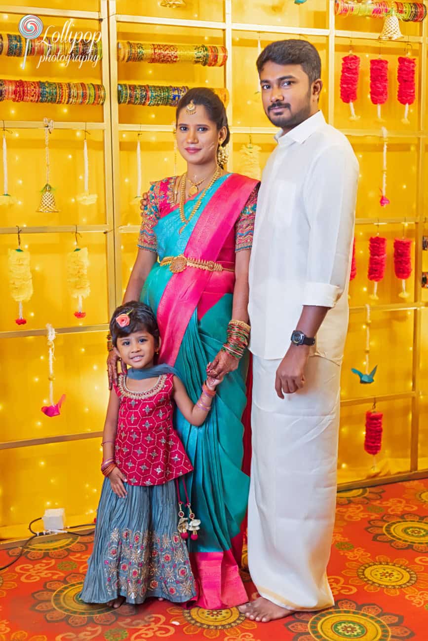 A family moment with Arthi, Naveen Kumar, and their daughter during the baby shower celebration in Chennai, captured by Lollipop Photography