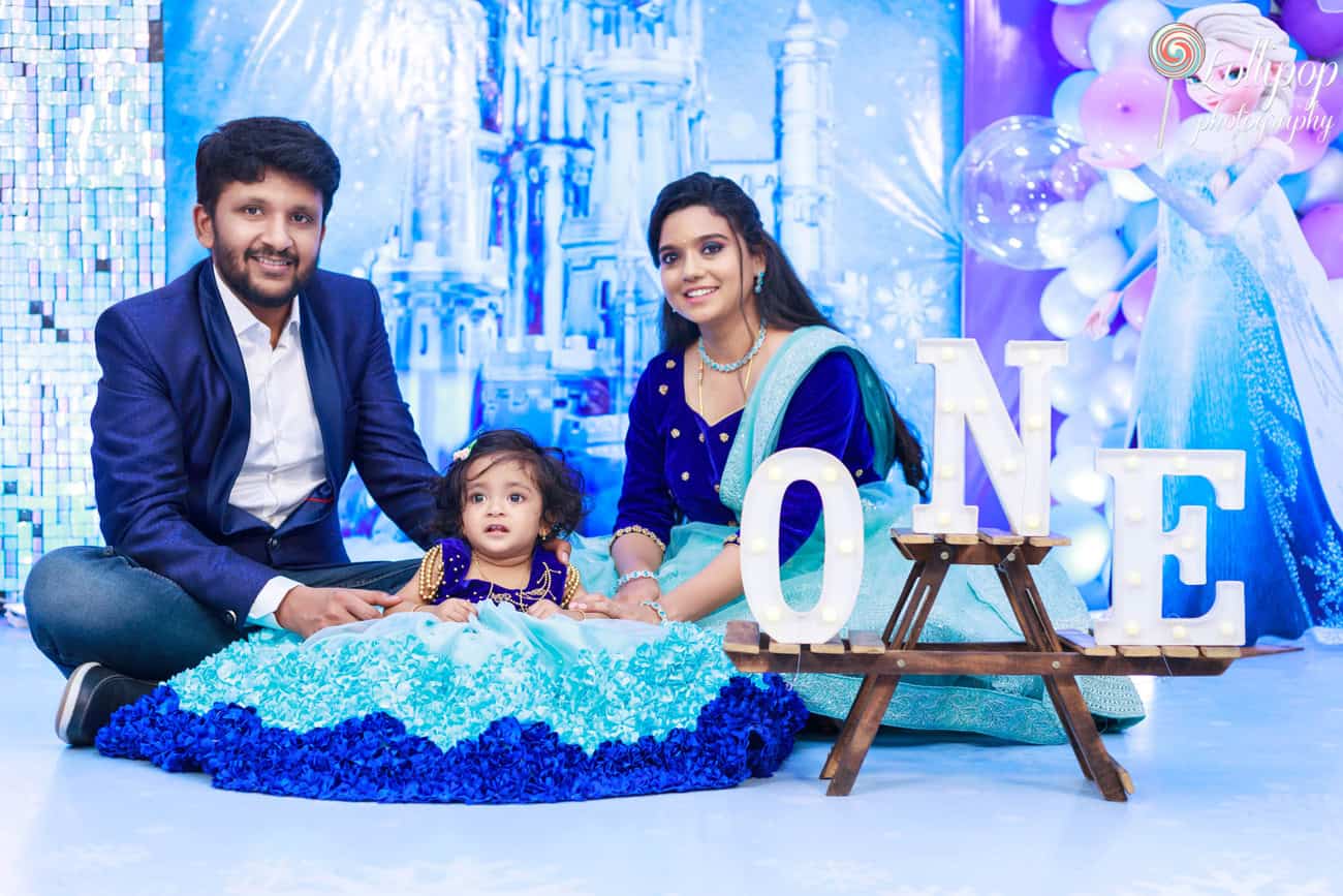 One-year-old Pranika with her parents, captured in a charming birthday photography session in Coimbatore