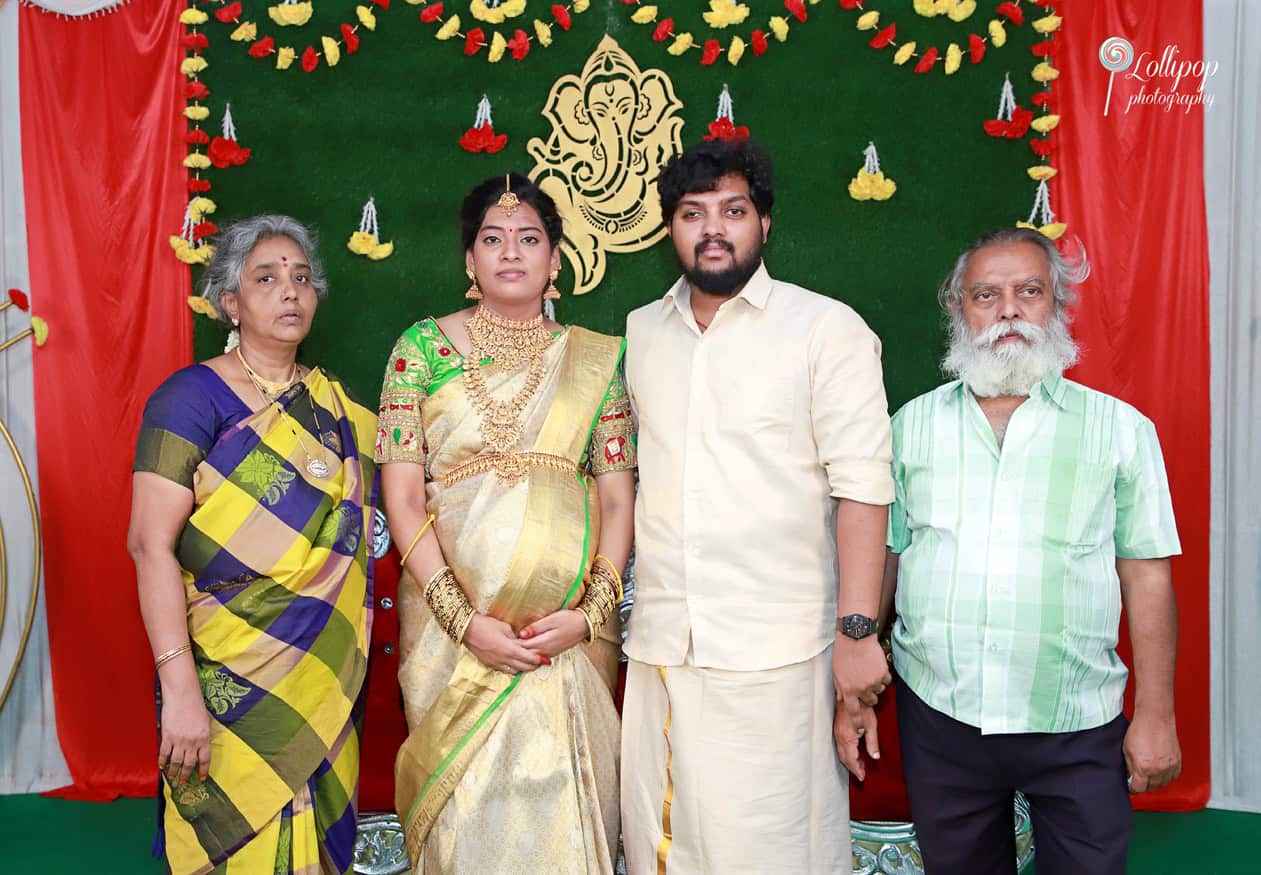 Anitha and her husband with loved ones at their baby shower in Coimbatore, a moment filled with joy, captured by Lollipop Photography