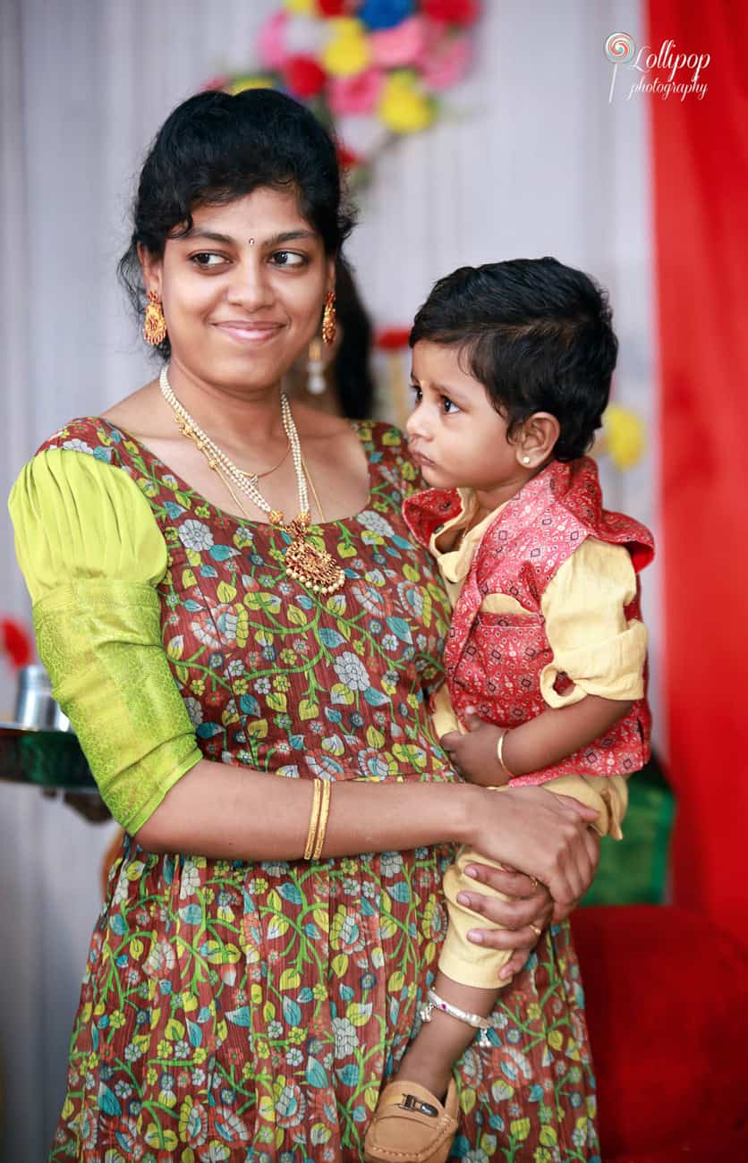 A heartwarming moment of a mother and child enjoying the baby shower celebration for Anitha in Coimbatore